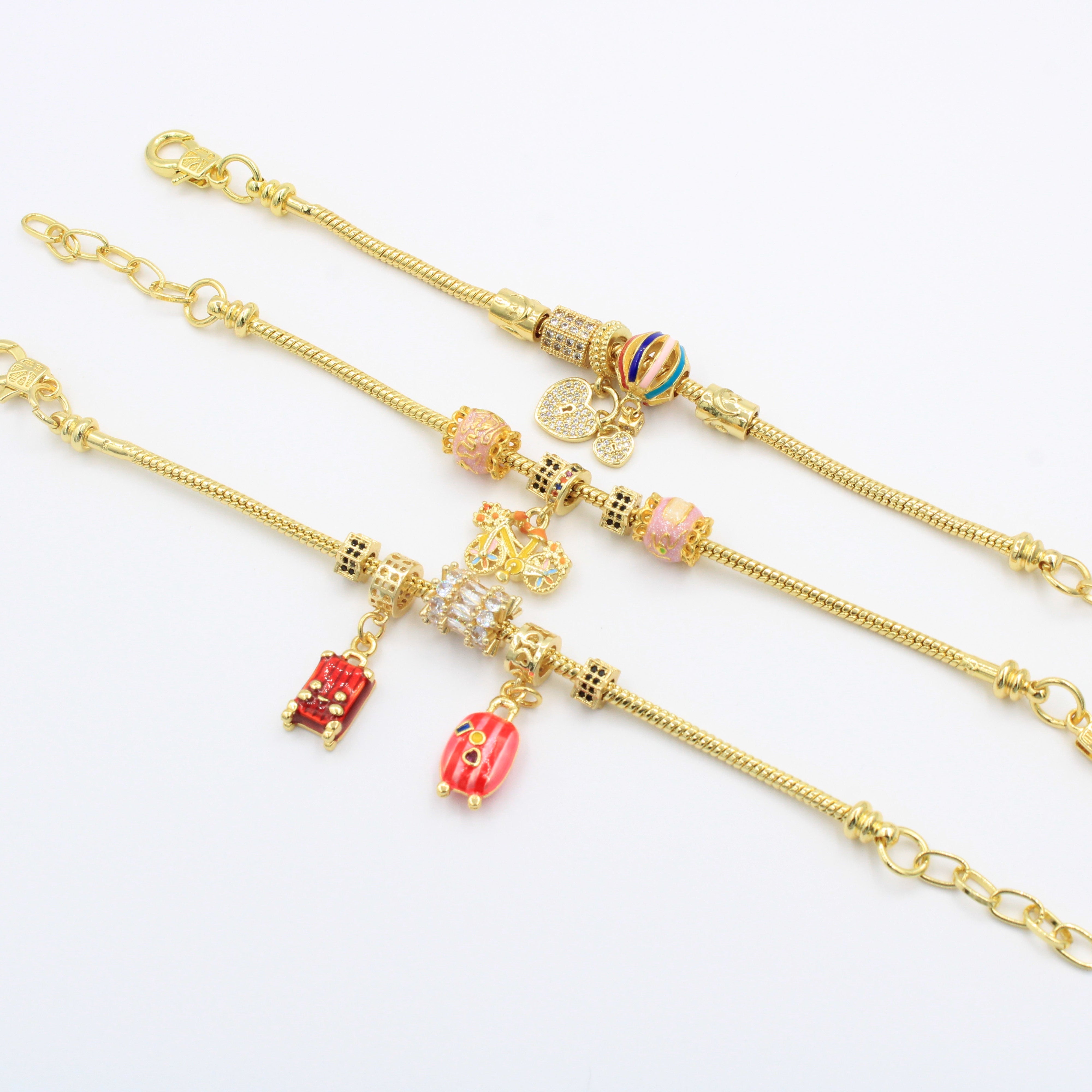 Paquete Pulseras 3pz con Dijes Fancy mod. 13010