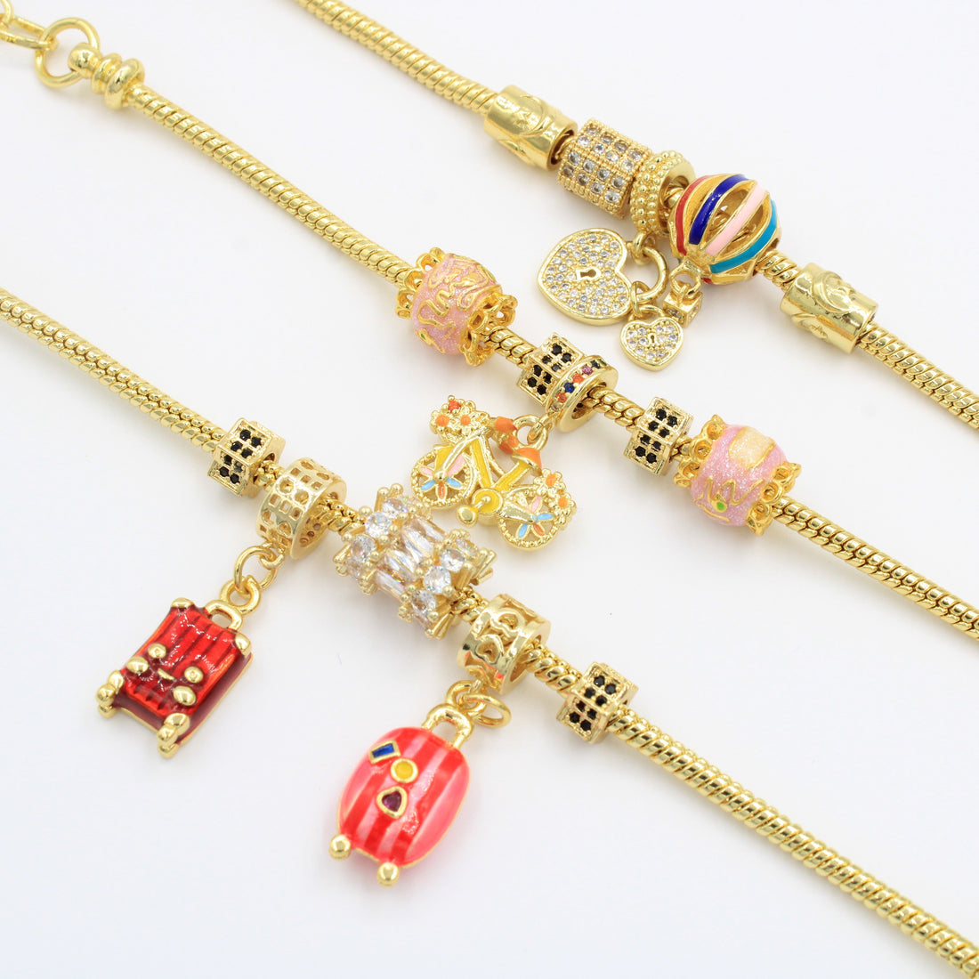 Paquete Pulseras 3pz con Dijes Fancy mod. 13010