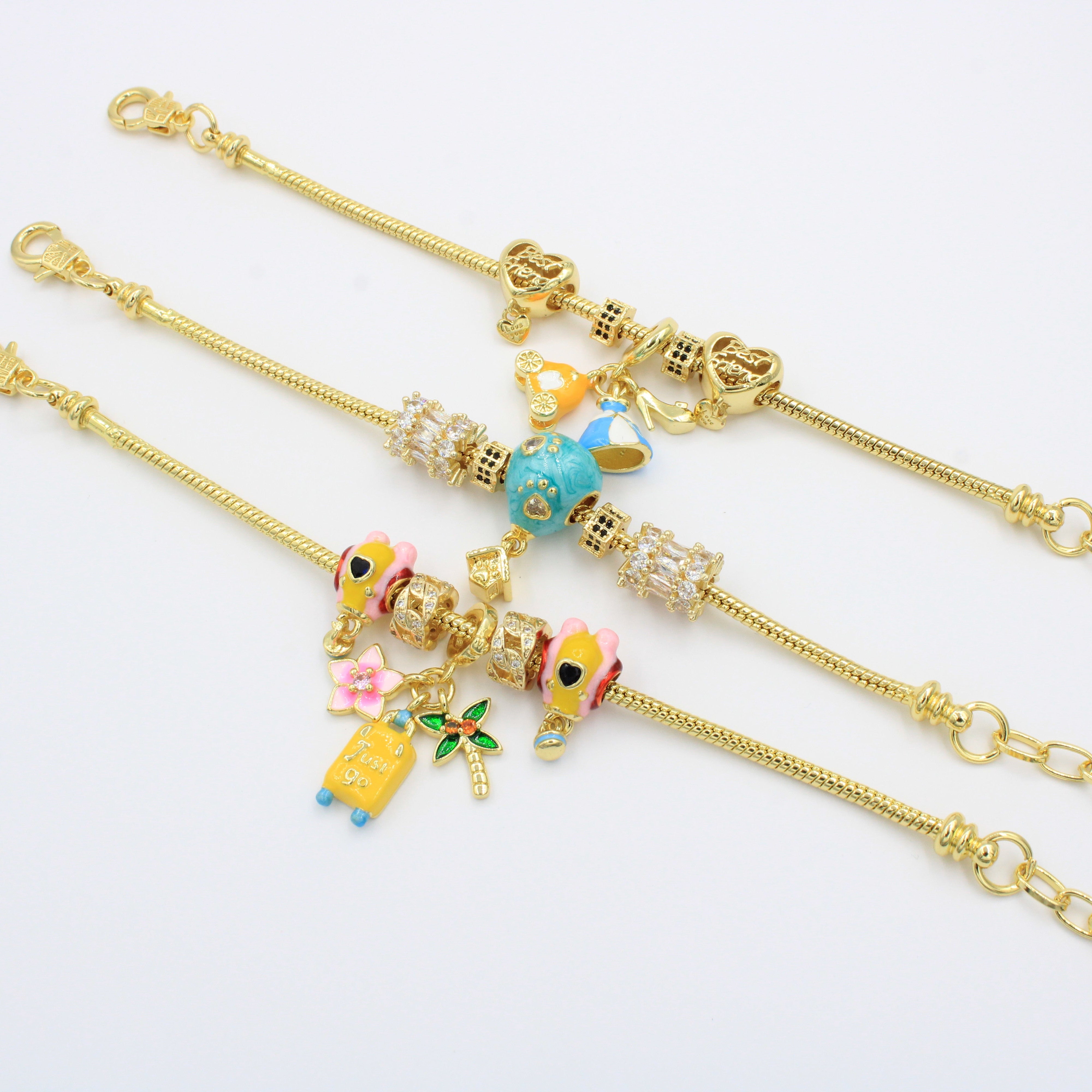 Paquete Pulseras 3pz con Dijes Fancy mod. 13011