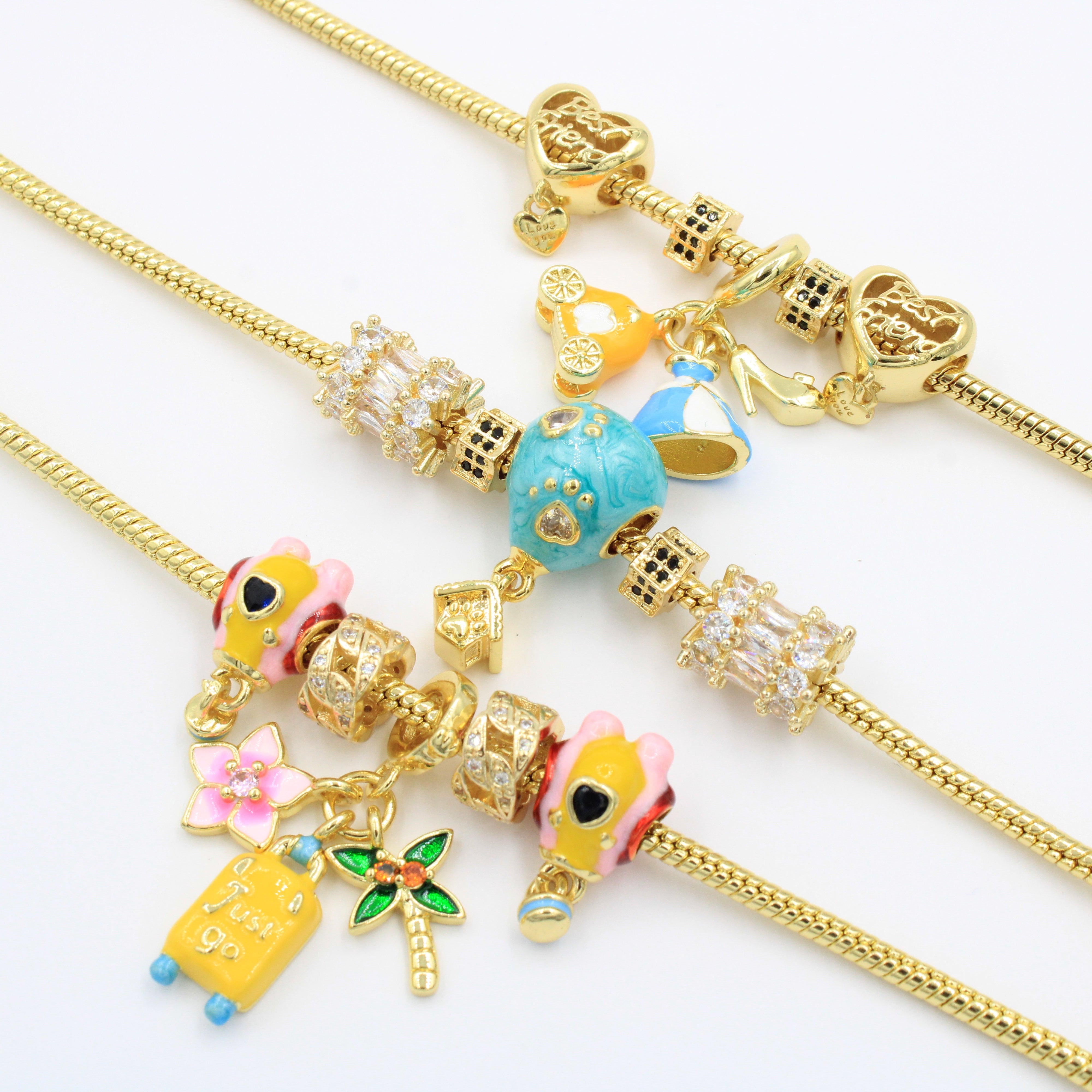 Paquete Pulseras 3pz con Dijes Fancy mod. 13011