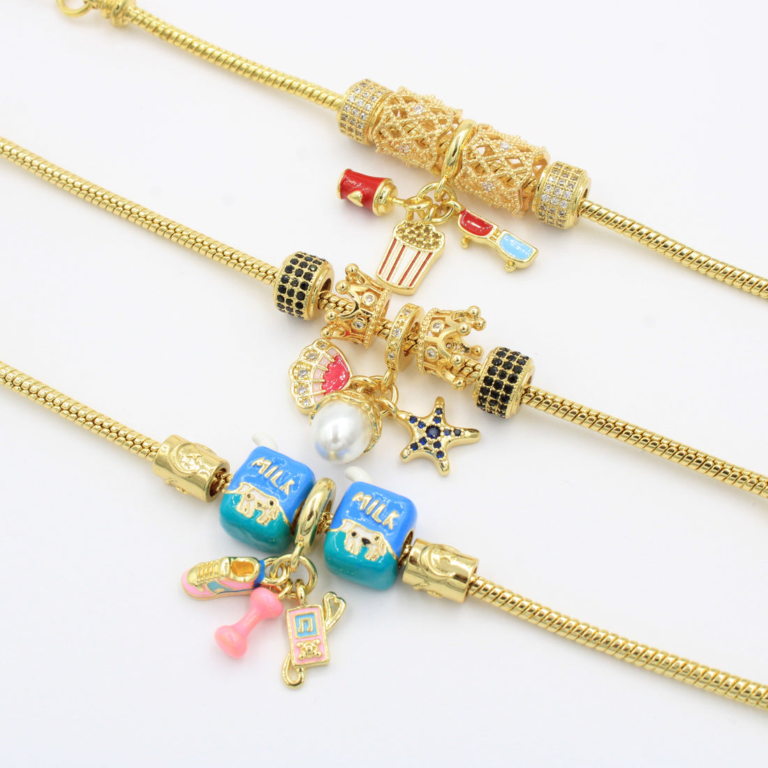 Paquete Pulseras 3pz con Dijes Fancy mod. 13012