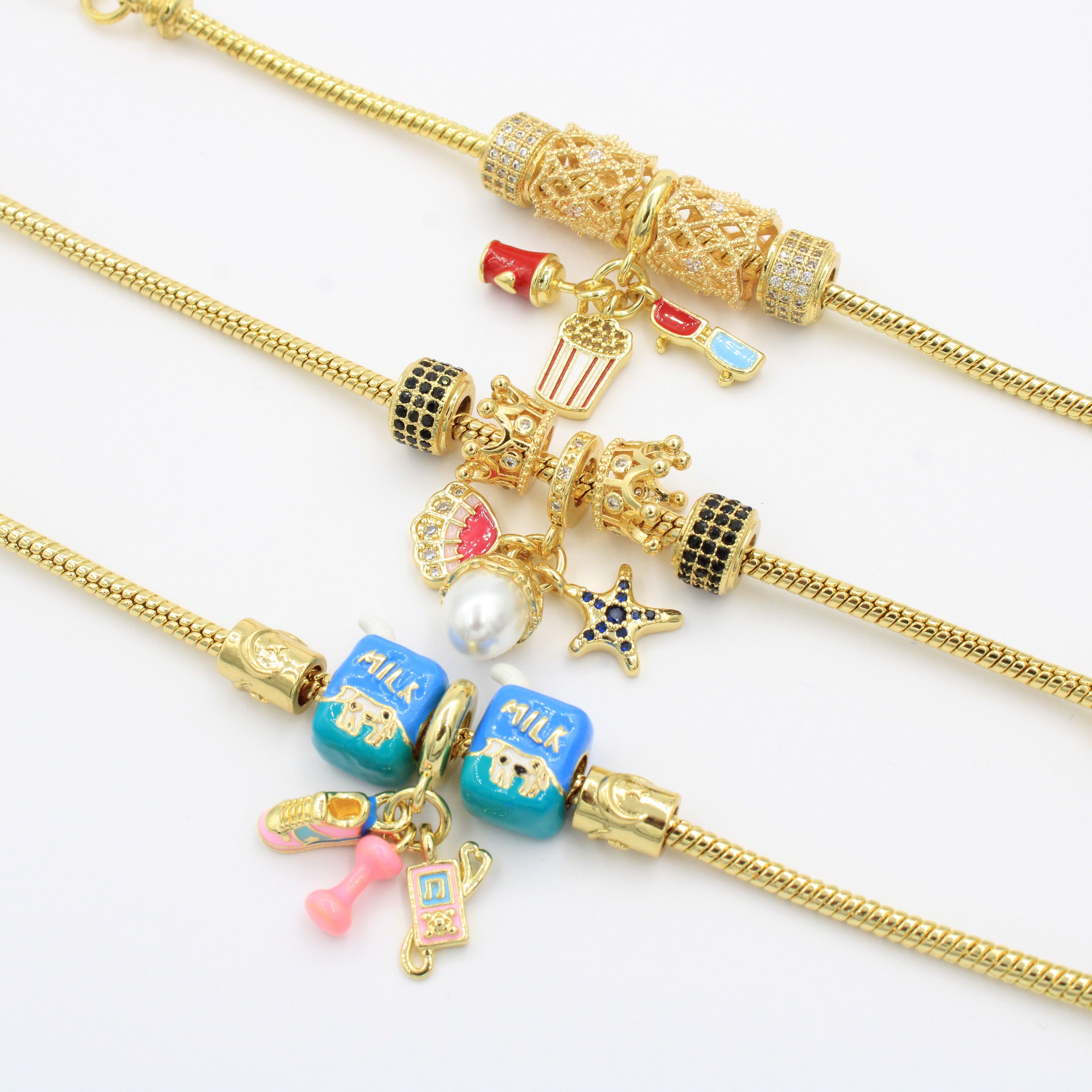 Paquete Pulseras 3pz con Dijes Fancy mod. 13012