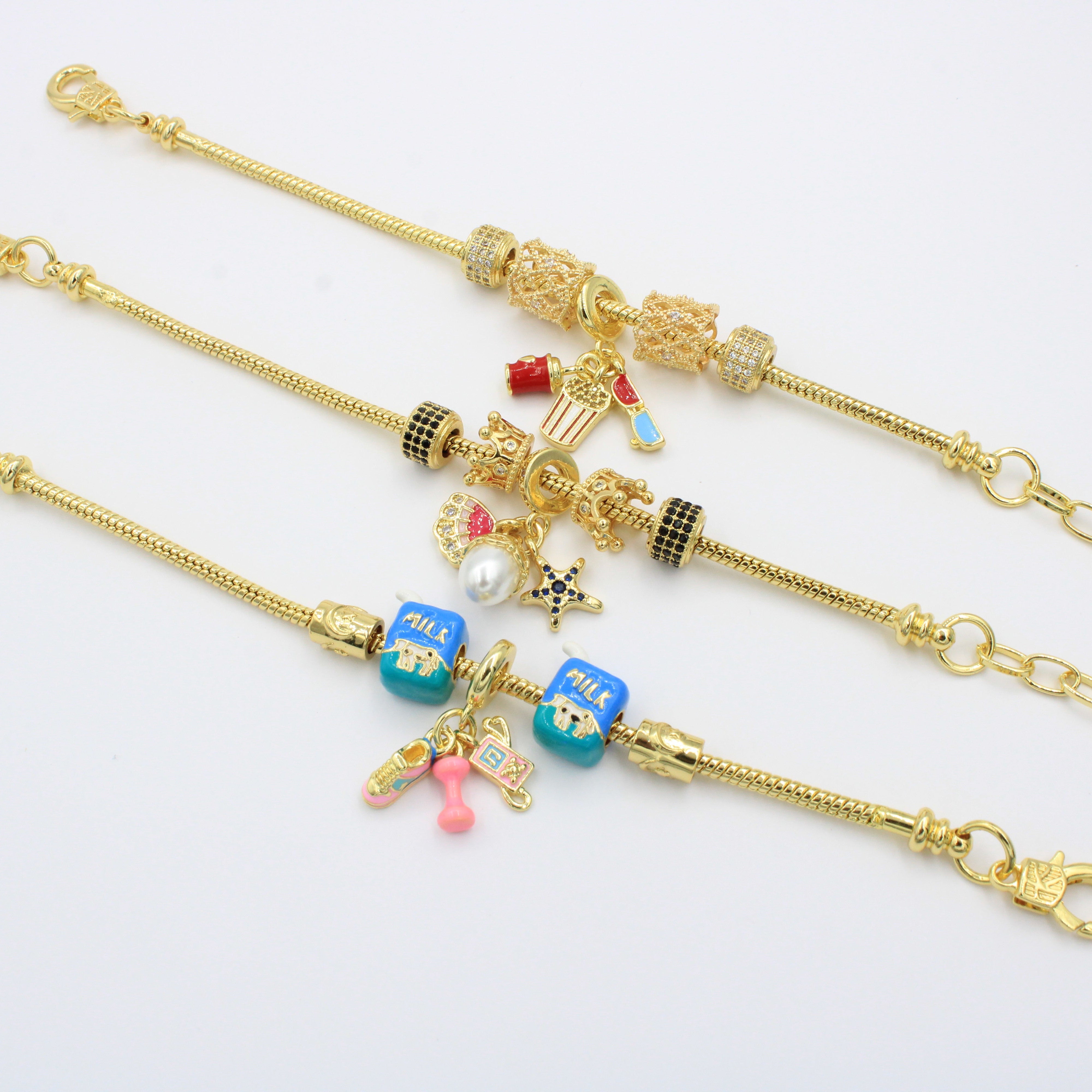 Paquete Pulseras 3pz con Dijes Fancy mod. 13015