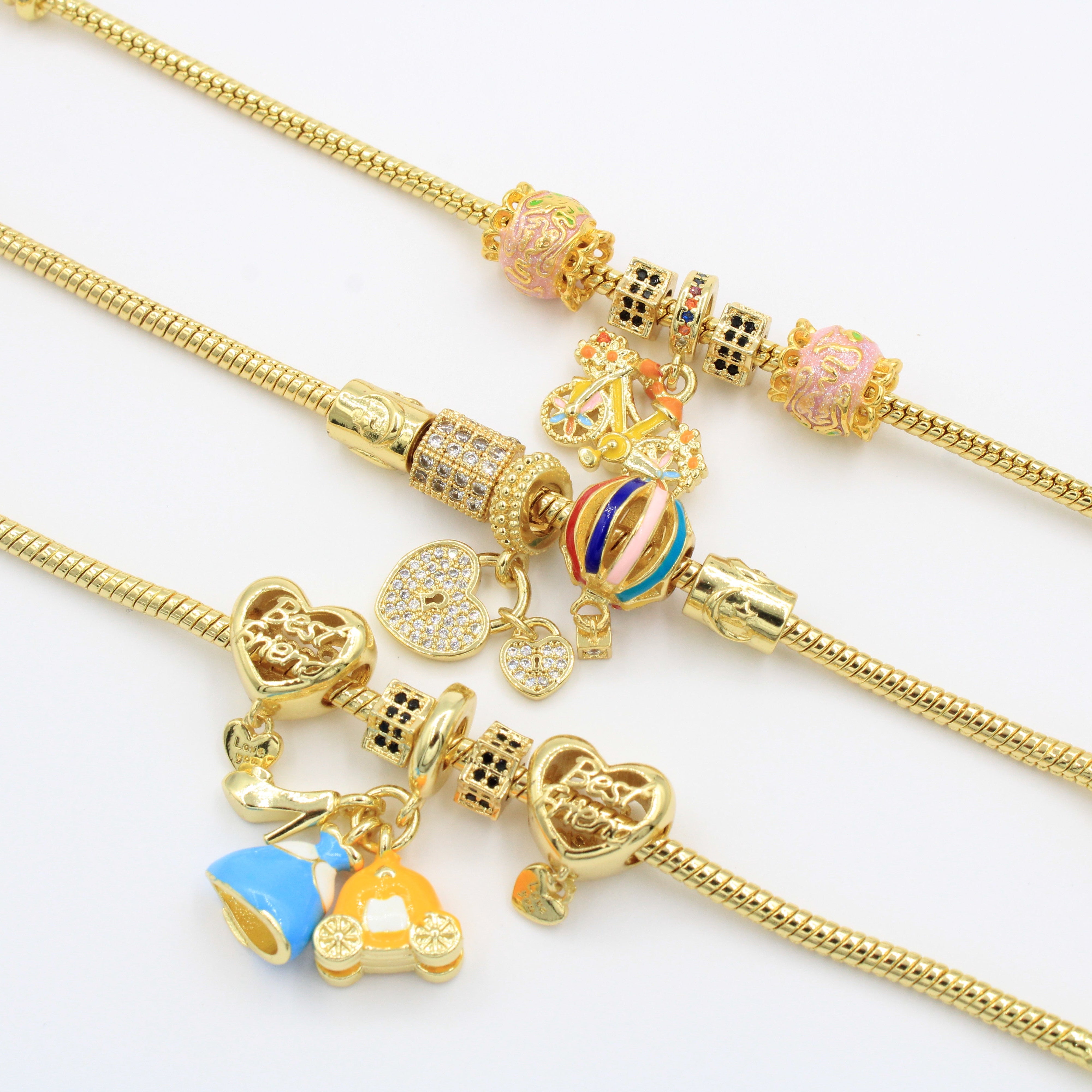 Paquete Pulseras 3pz con Dijes Fancy mod. 13014