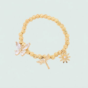Pulsera Oro Laminado Tejido Esferas Diamantadas con Dijes Primavera mod. 1532