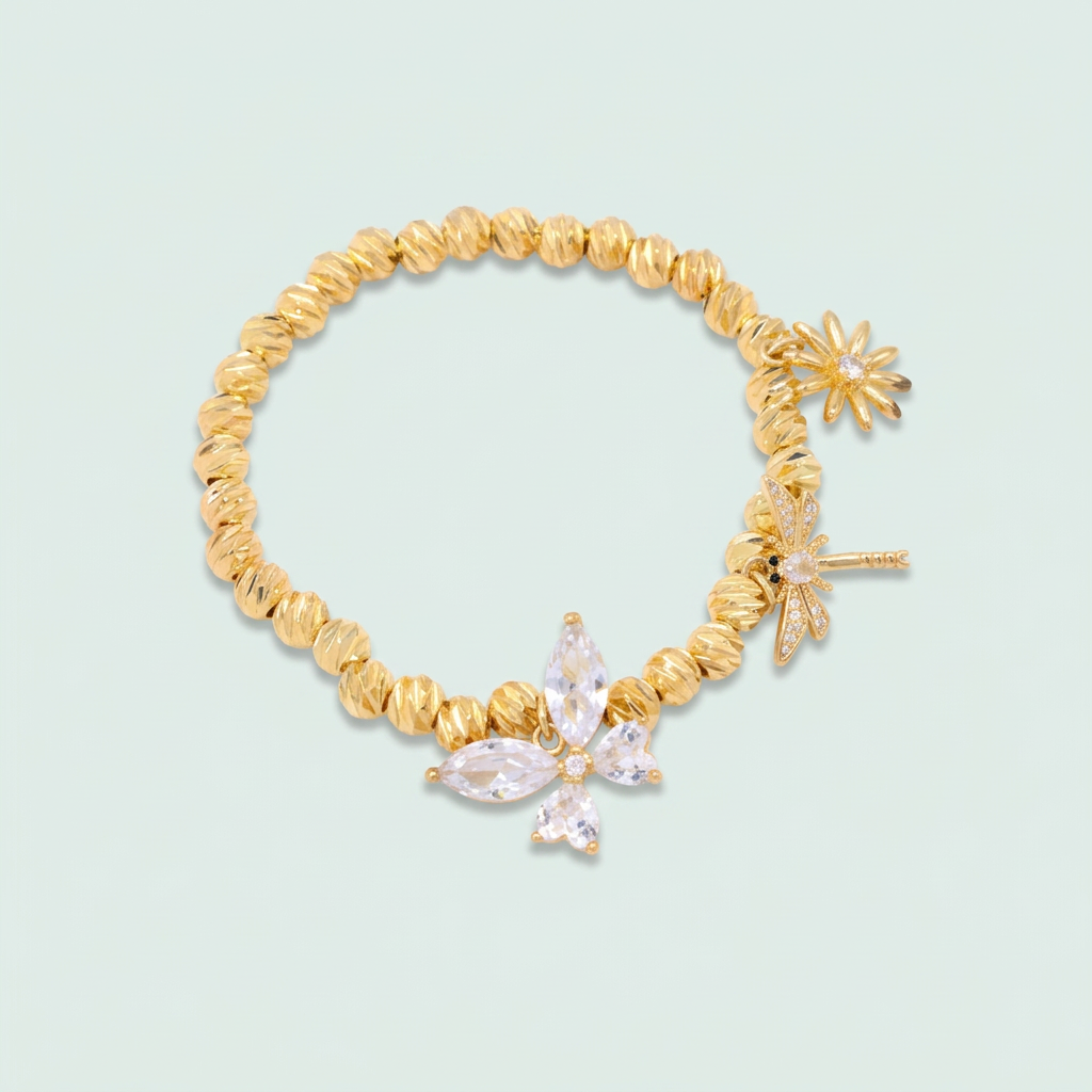 Pulsera Oro Laminado Tejido Esferas Diamantadas con Dijes Primavera mod. 1532