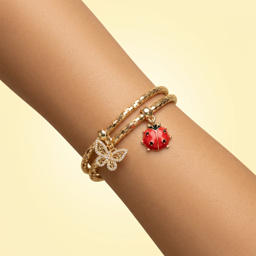 Pulsera de Goldfilled Estilo Tubular Especial Hueco con Colgantes de Primavera mod. 1099