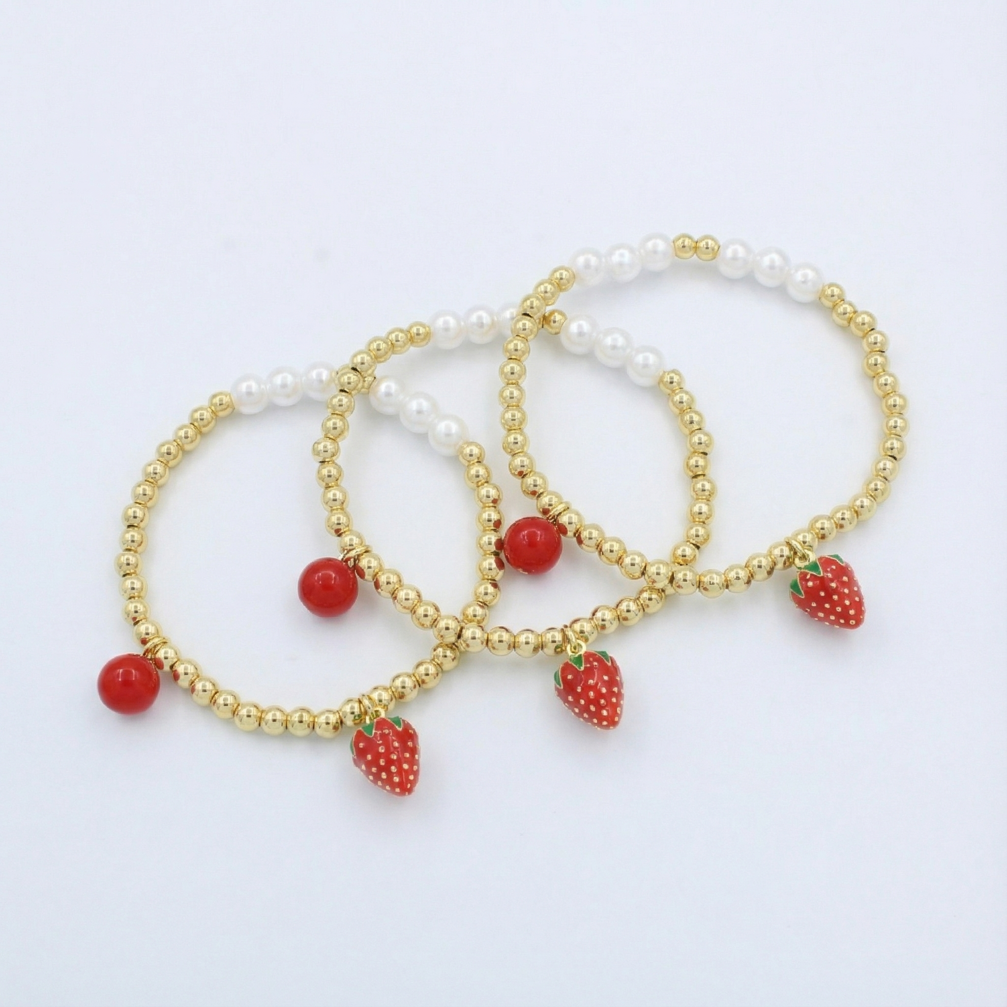 Paquete Pulsera Goldfilled 3pz Fresa mod. 13042