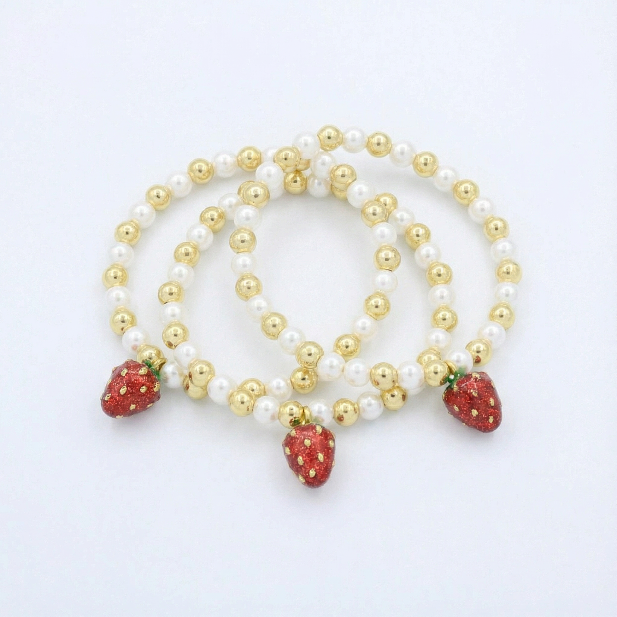 Paquete Pulsera Goldfilled 2pz Colagante de Fresa mod. 13044